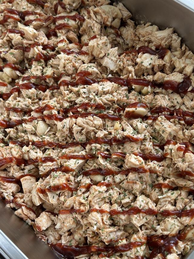 Chopped barbecue chicken drizzled with barbecue sauce
